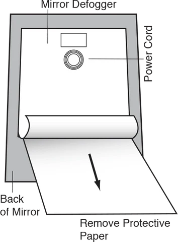 Close-up of the electric mirror defogger pad showing its thin, adhesive backing for easy installation.